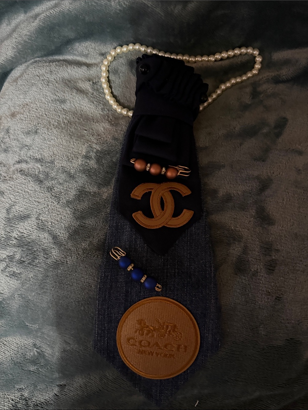 Coach Navy Tie Pendant with Tan Leather Logo and Pearl Chain